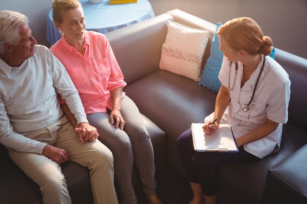 elderly couple talking to nurse the plan nursing care our difference Endless Journey Hospice Omaha Nebraska