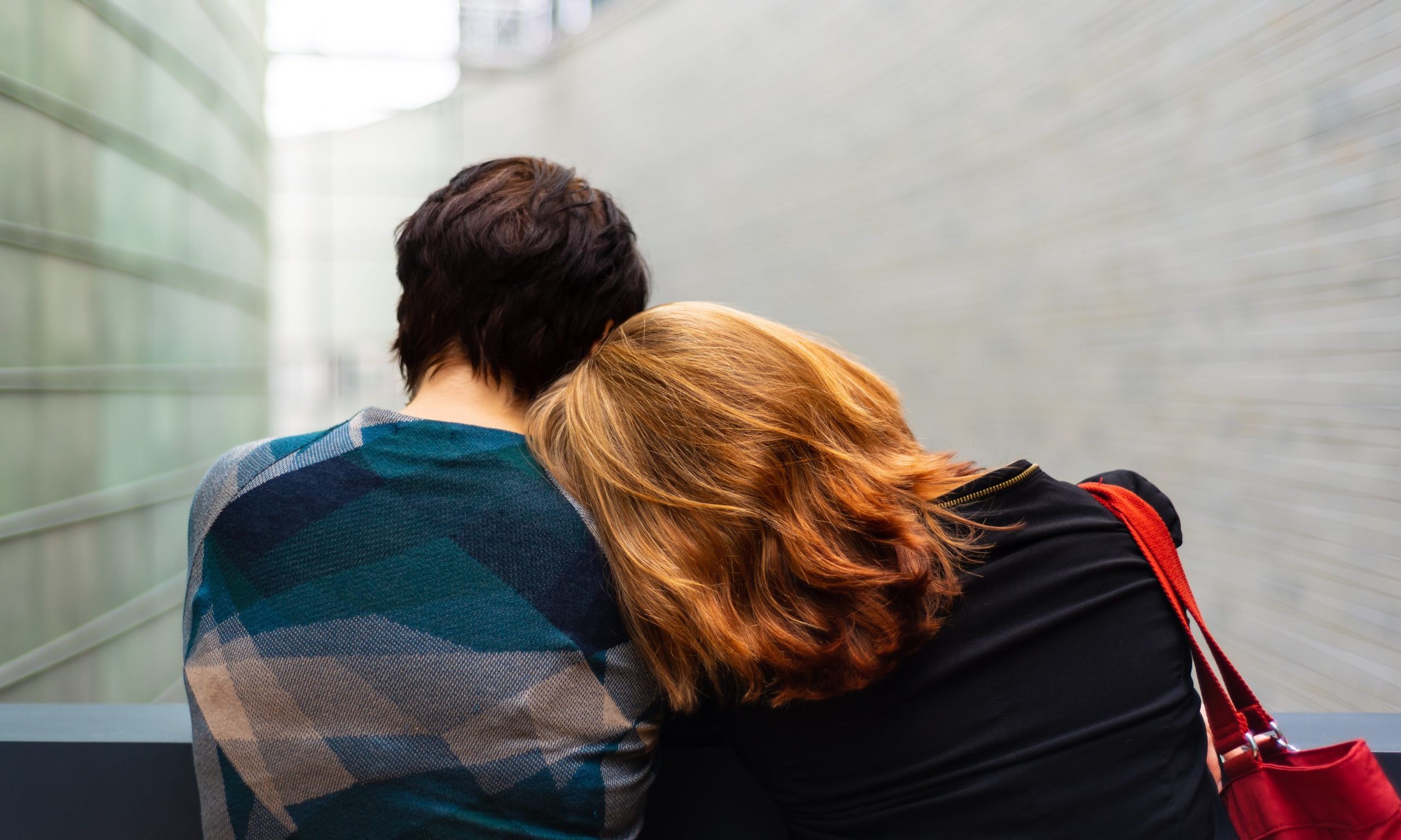 Mother resting head on son's shoulder our care grief support Endless Journey Hospice Omaha Nebraska about